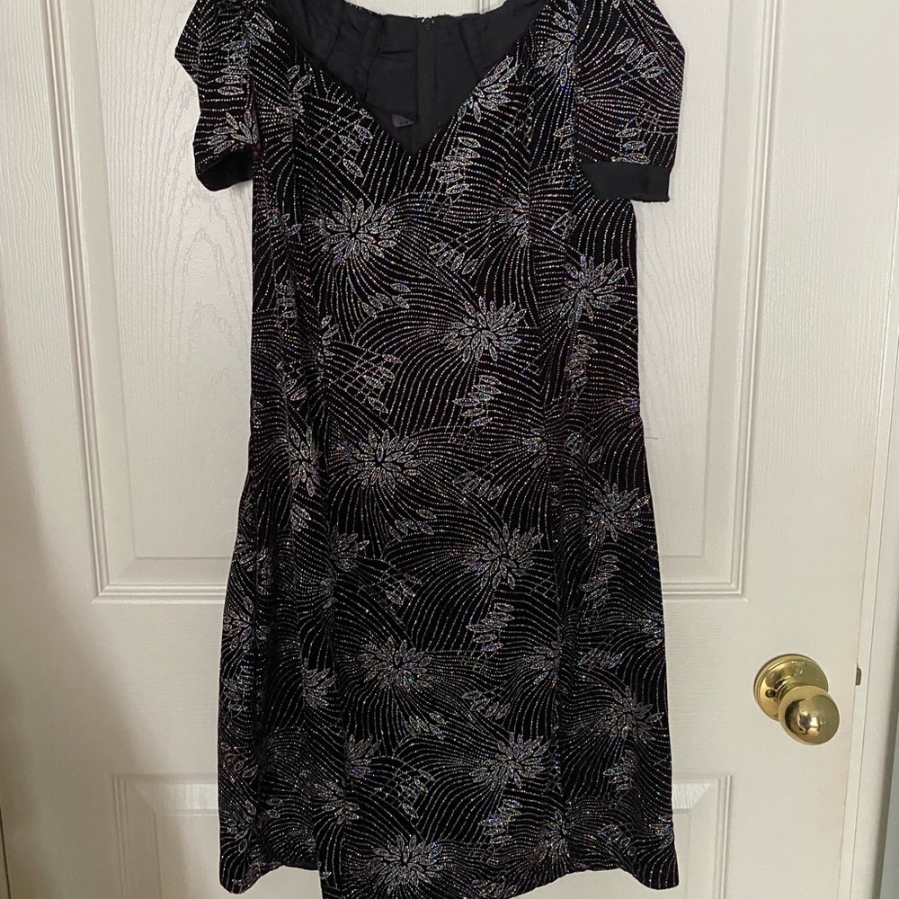 Black velvet cocktail dress. Says size 11 but hits like a size 8
